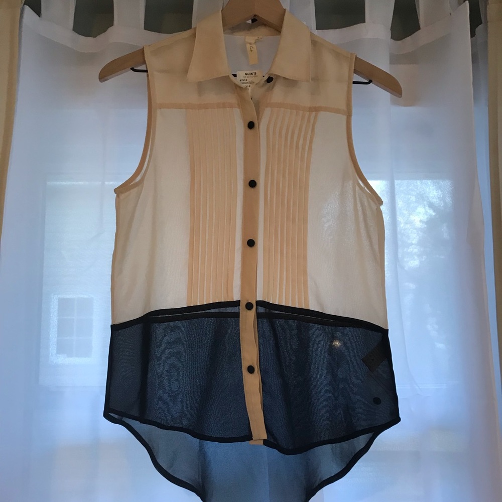 Button down blouse. Brand new, never worn.